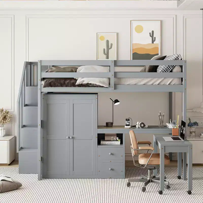 Struttura letto a soppalco a grandezza naturale con scale, libreria, cassetti, scrivania e armadio