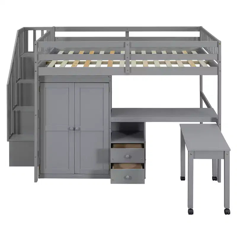 Struttura letto a soppalco a grandezza naturale con scale, libreria, cassetti, scrivania e armadio