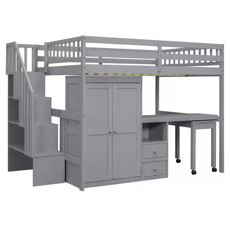Struttura letto a soppalco a grandezza naturale con scale, libreria, cassetti, scrivania e armadio